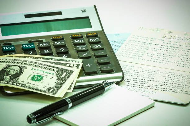 Pen notebook saving account passbook and calculator