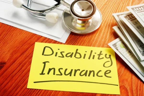 Disability Insurance memo sign with money to demonstrate updates in California SDI withholdings from SB 951.